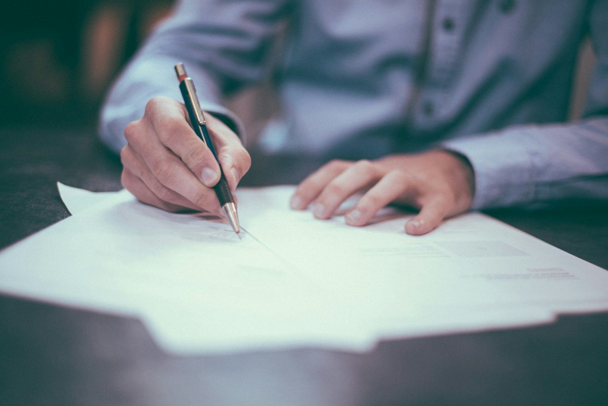 Financial paperwork being reviewed at a desk